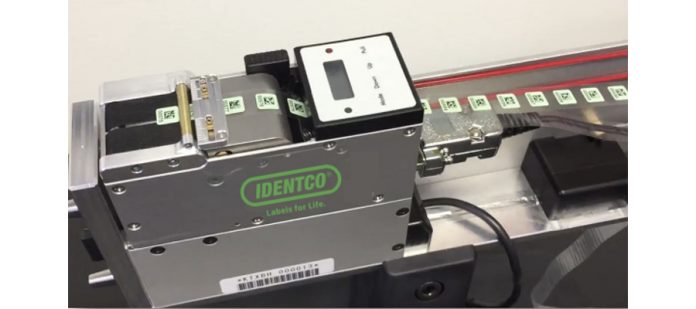 Emerald EMS Enhances Efficiency & Performance with IDENTCO Label Feeder